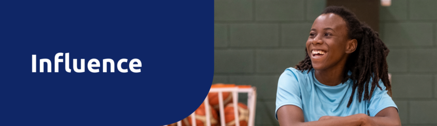 Influence header, image behind shows young adult in a wheelchair, looking happy holding a basketball. There are basketballs behind him and he seems to be in a school gymnasium.